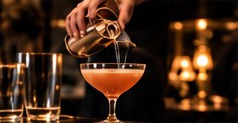 Bartender pouring a cocktail