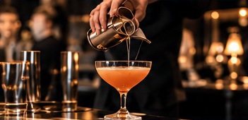 Bartender pouring a cocktail